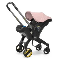 Doona Car Seat - Blush Pink (With Essential Bag)